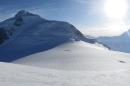 Remote Alaskan mountain with snow in foreground